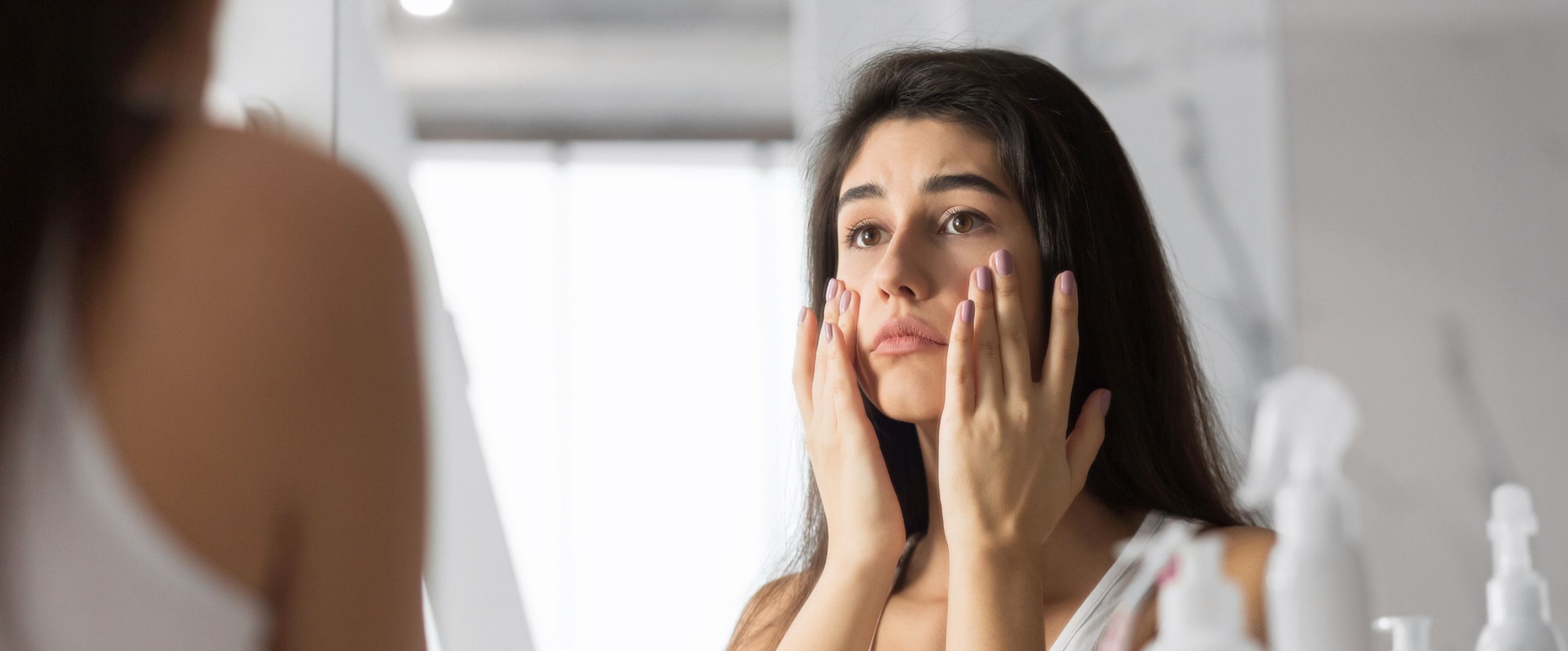 woman concerned on under eye bags