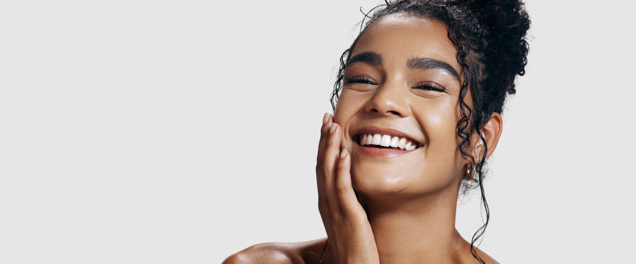 woman glowing after skin treatment